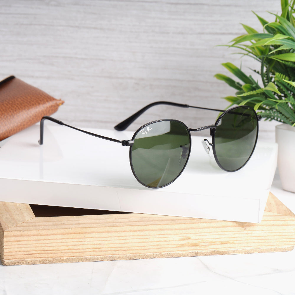 Classic Round 3447 Black-Green Sunglass with black frame and green lenses featuring UV 400 protection from JUO INDIA.
