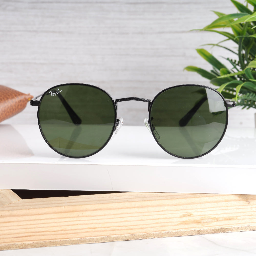 Classic Round 3447 Black-Green Sunglass with black frame and green lenses featuring UV 400 protection from JUO INDIA.
