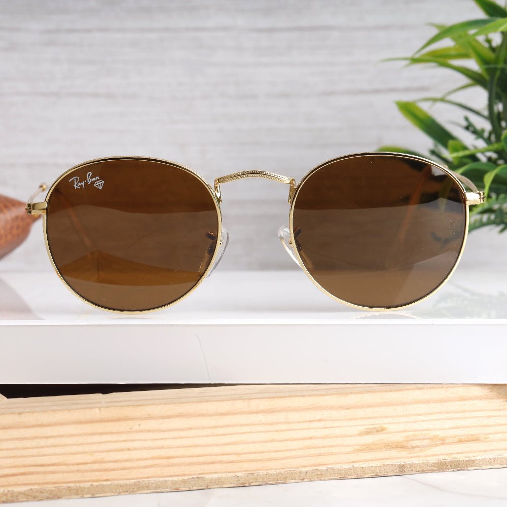 Classic Round 3447 Gold-Brown Sunglass with gold frame and brown lenses featuring UV 400 protection from JUO INDIA.
