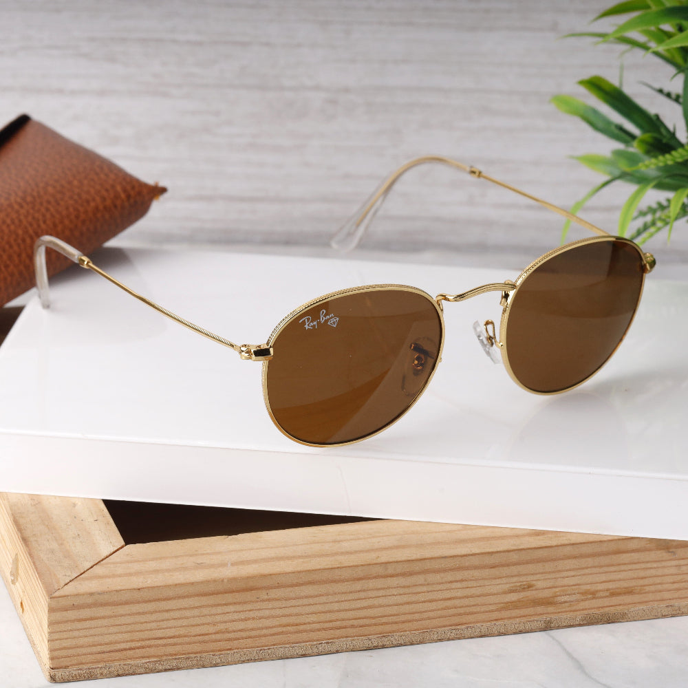Classic Round 3447 Gold-Brown Sunglass with gold frame and brown lenses featuring UV 400 protection from JUO INDIA.
