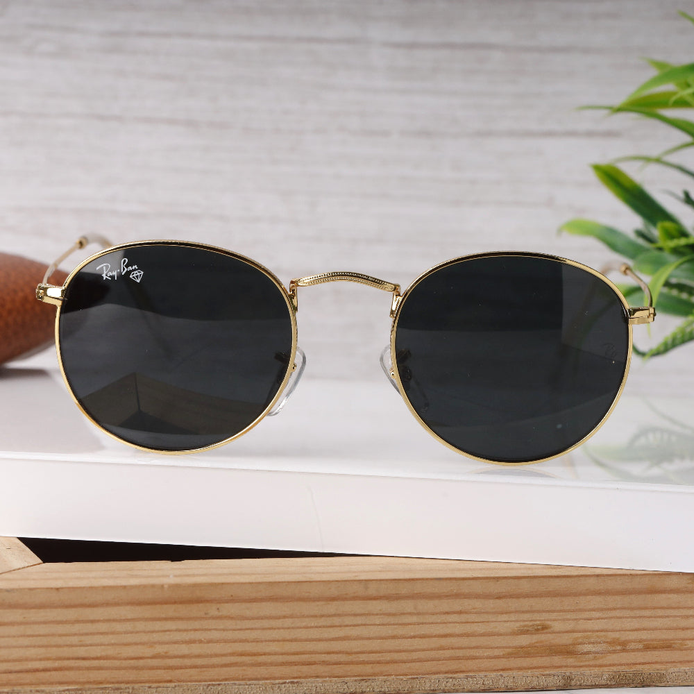 Classic Round 3447 Gold-Black Sunglass with gold frame and UV 400 black lenses from JUO INDIA.
