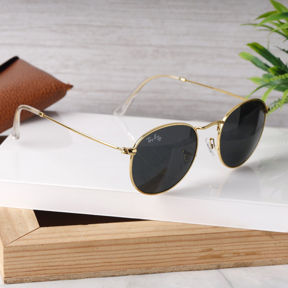 Classic Round 3447 Gold-Black Sunglass with gold frame and UV 400 black lenses from JUO INDIA.
