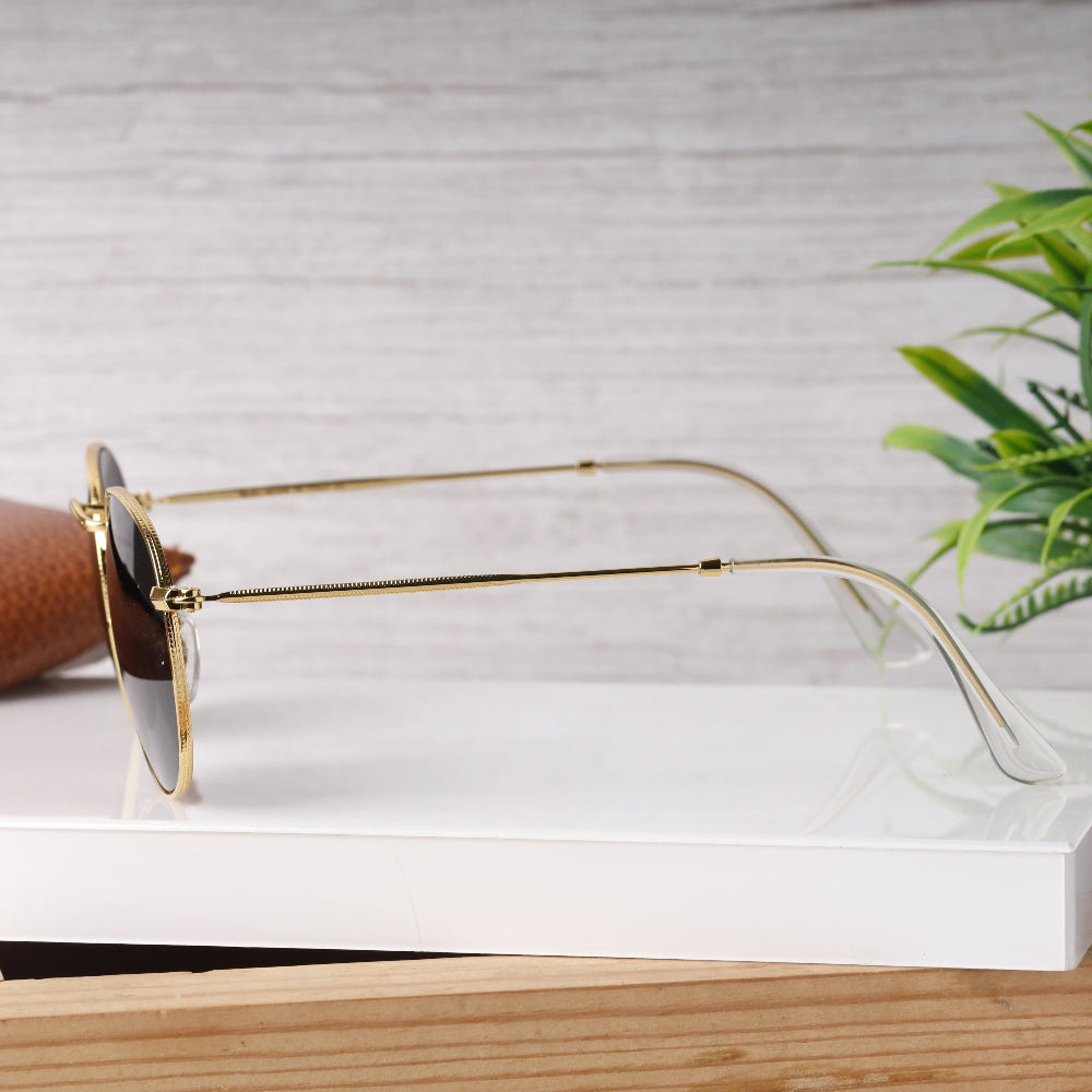 Classic Round 3447 Gold-Black Sunglass with gold frame and UV 400 black lenses from JUO INDIA.
