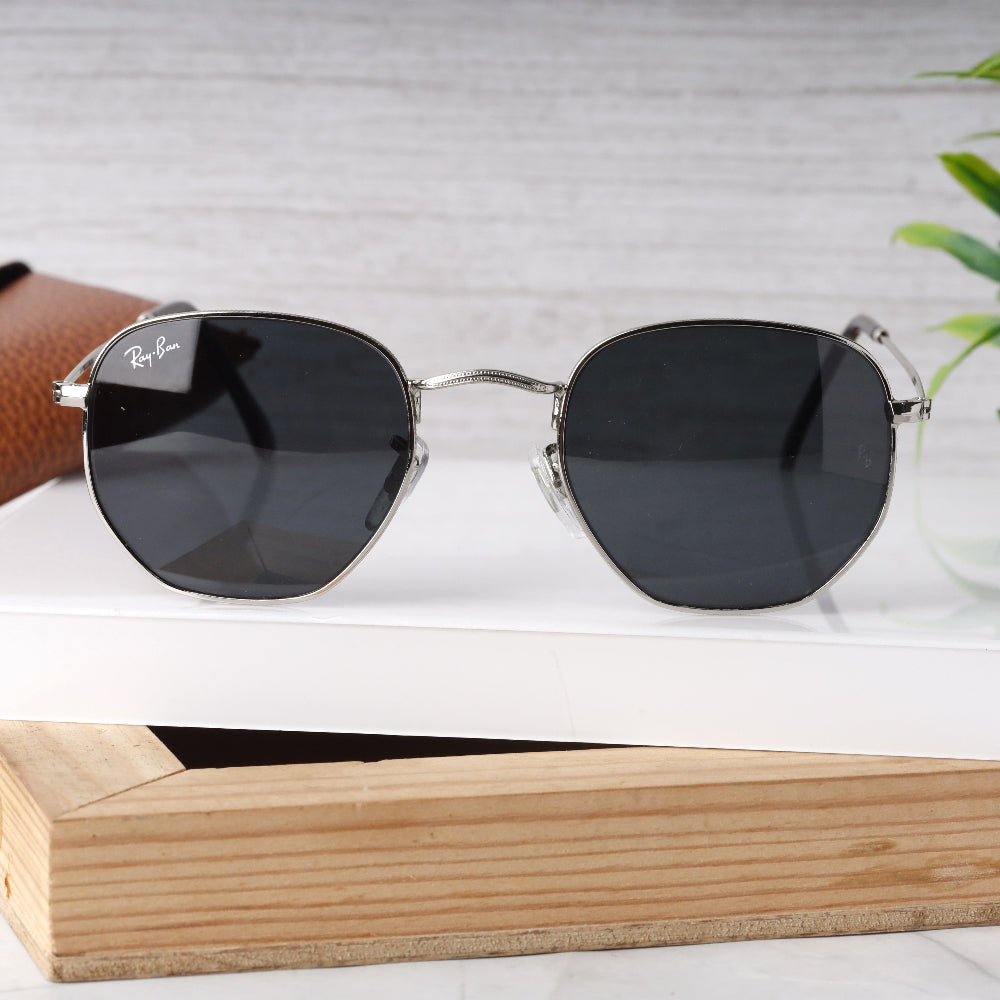Classic Hexagonal 3548N Silver-Black Sunglass with silver frame and UV 400 black lenses from JUO INDIA.
