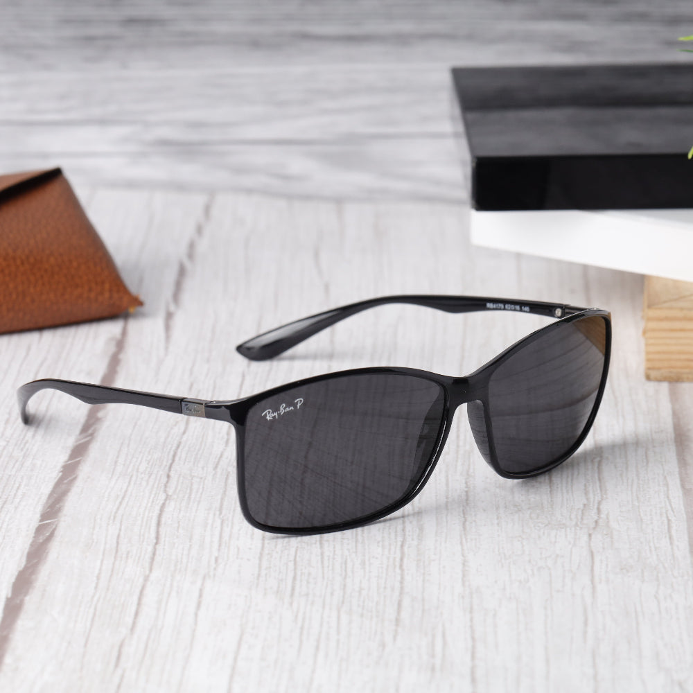 Classic Rectangle 4179 Black-Black Polarised Sunglass with UV 400 protection and shining black frame from JUO INDIA.
