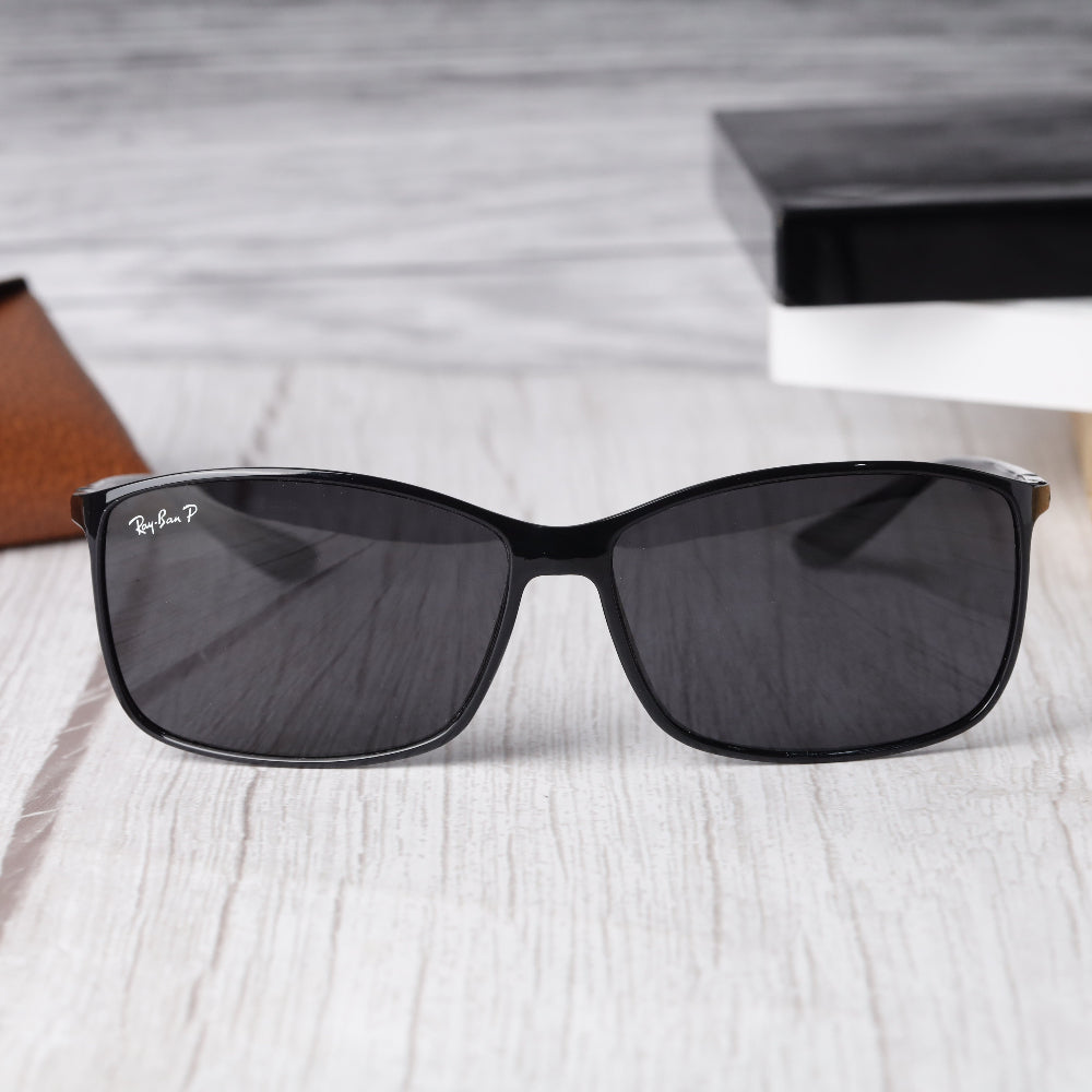 Classic Rectangle 4179 Black-Black Polarised Sunglass with UV 400 protection and shining black frame from JUO INDIA.
