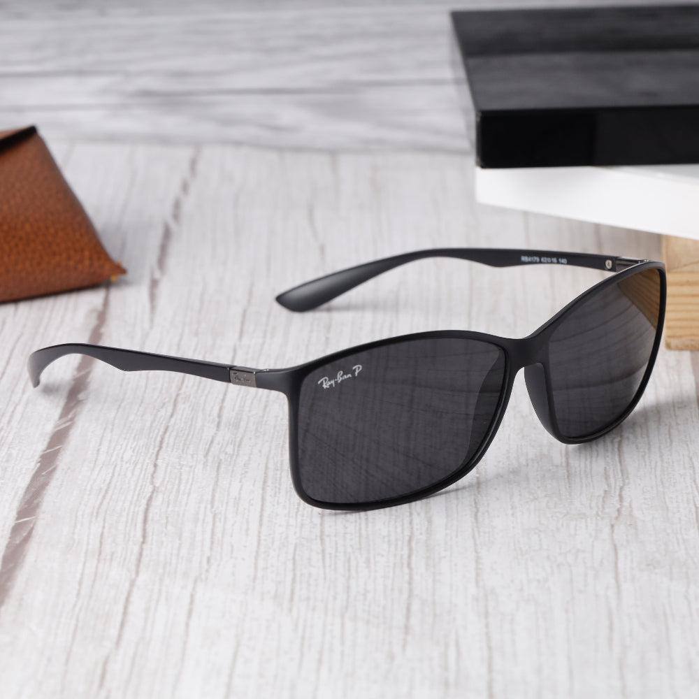 Classic Rectangle 4179 Black-Black Polarised Sunglass with UV 400 protection and matte black frame from JUO INDIA.
