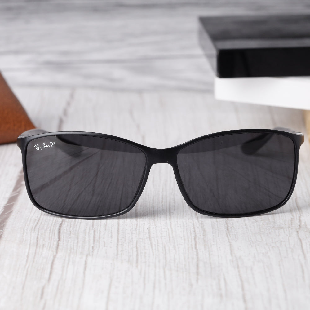 Classic Rectangle 4179 Black-Black Polarised Sunglass with UV 400 protection and matte black frame from JUO INDIA.
