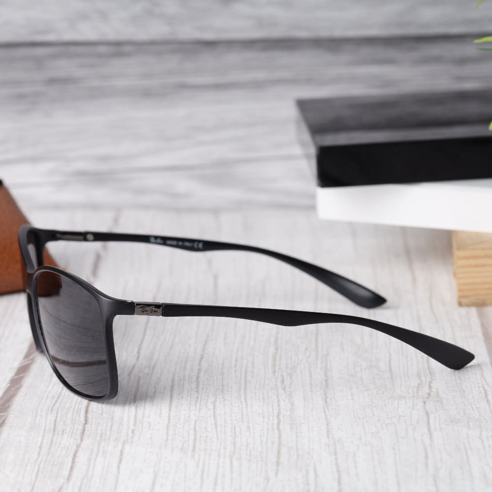 Classic Rectangle 4179 Black-Black Polarised Sunglass with UV 400 protection and matte black frame from JUO INDIA.
