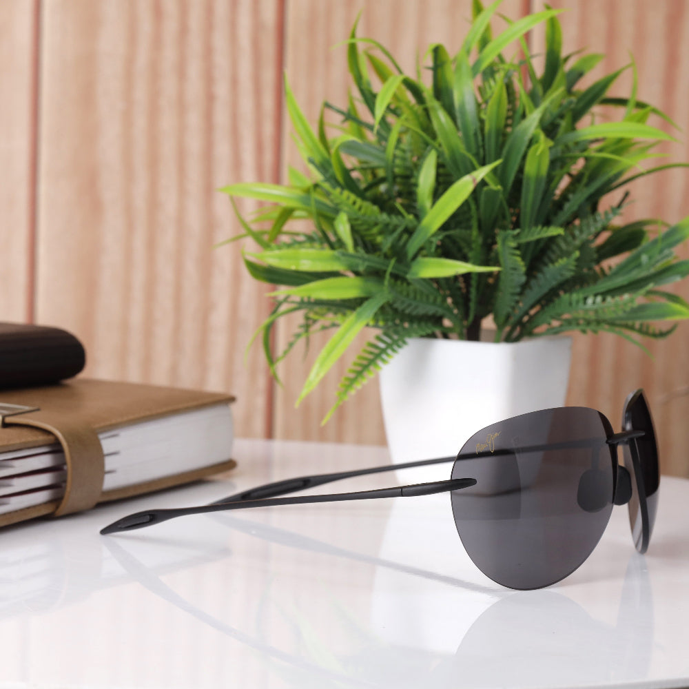 Maui Jim Sugar Beach MJ HT 421 sunglasses with black frame and UV 400 protected lenses. Unisex design, comfortable fit, perfect for all face shapes. Available now at JUO INDIA.
