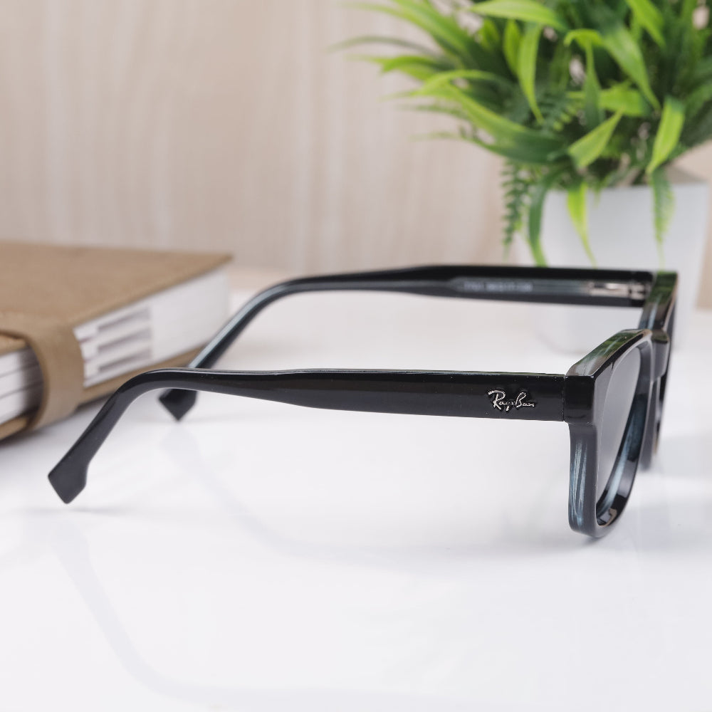 Classic Square 7701 Full Black Polarised Sunglass with matte black frame and polarised lenses featuring UV 400 protection from JUO INDIA.
