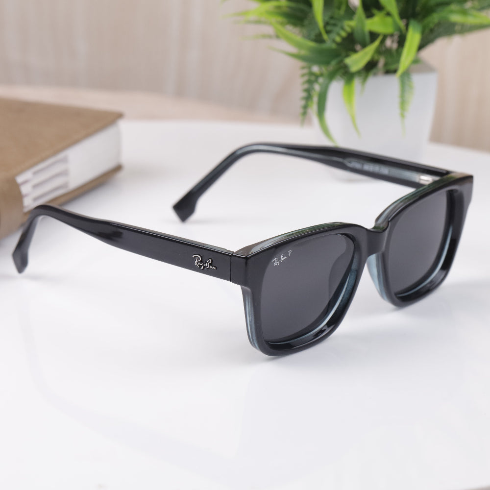 Classic Square 7701 Full Black Polarised Sunglass with matte black frame and polarised lenses featuring UV 400 protection from JUO INDIA.
