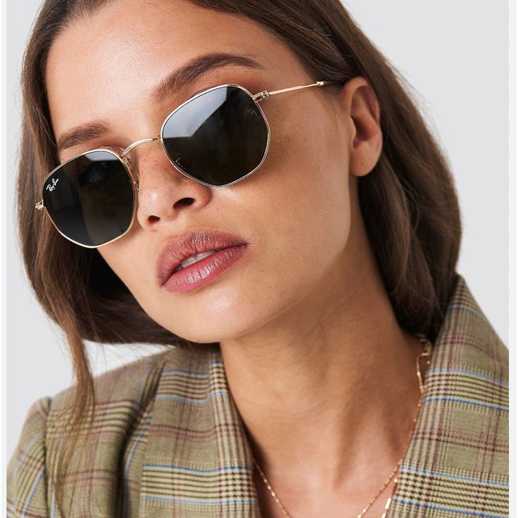 Classic Hexagonal 3548N Gold-Black Sunglass with gold frame and UV 400 black lenses from JUO INDIA.
