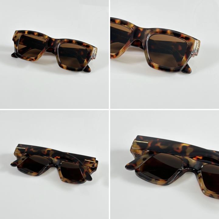 T0m F0rd 184 Tortoise-Brown Sunglass (Shining) with rich tortoise frame and warm brown lenses. UV400 protection with glossy finish for a premium and timeless style.